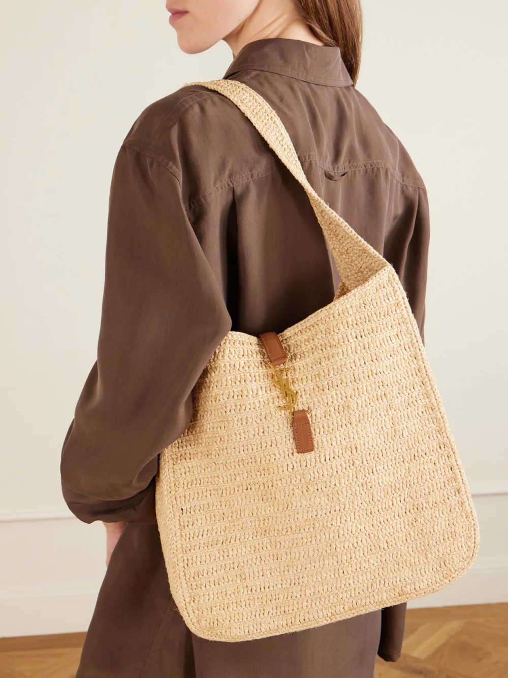 Saint Laurent Le 5 À 7 Leather-trimmed Raffia Shoulder Bag, styled view