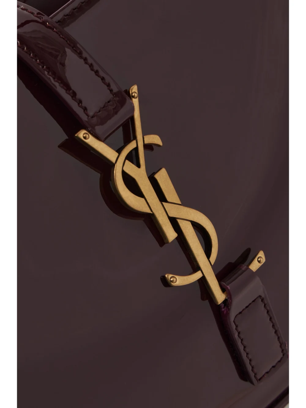 Close-up detail of the Saint Laurent Le 5 À 7 Patent-leather Shoulder Bag