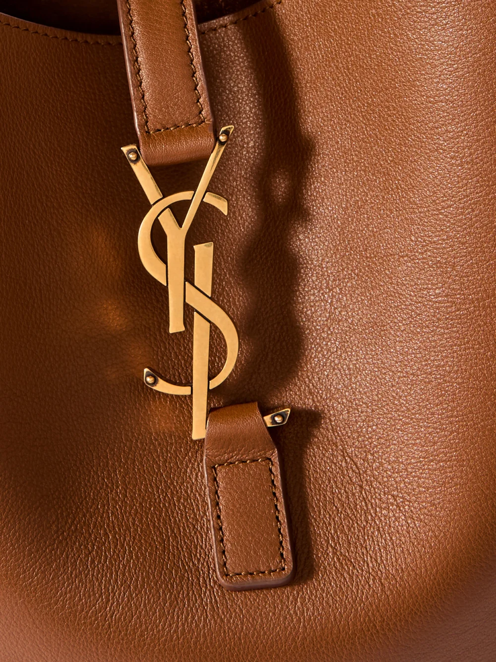 Close-up detail of the Saint Laurent Le 5 À 7 Supple Large Leather Shoulder Bag