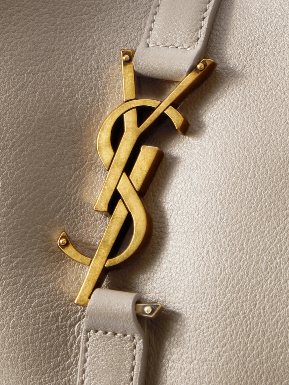 Close-up detail of the Saint Laurent Le 5 À 7 Supple Large Leather Shoulder Bag