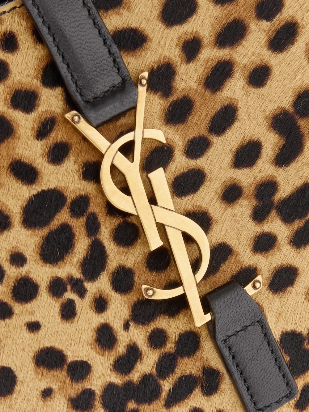 Close-up detail of the Saint Laurent Le 5 À 7 Supple Small Leather-trimmed Leopard-print Pony Hair Shoulder Bag