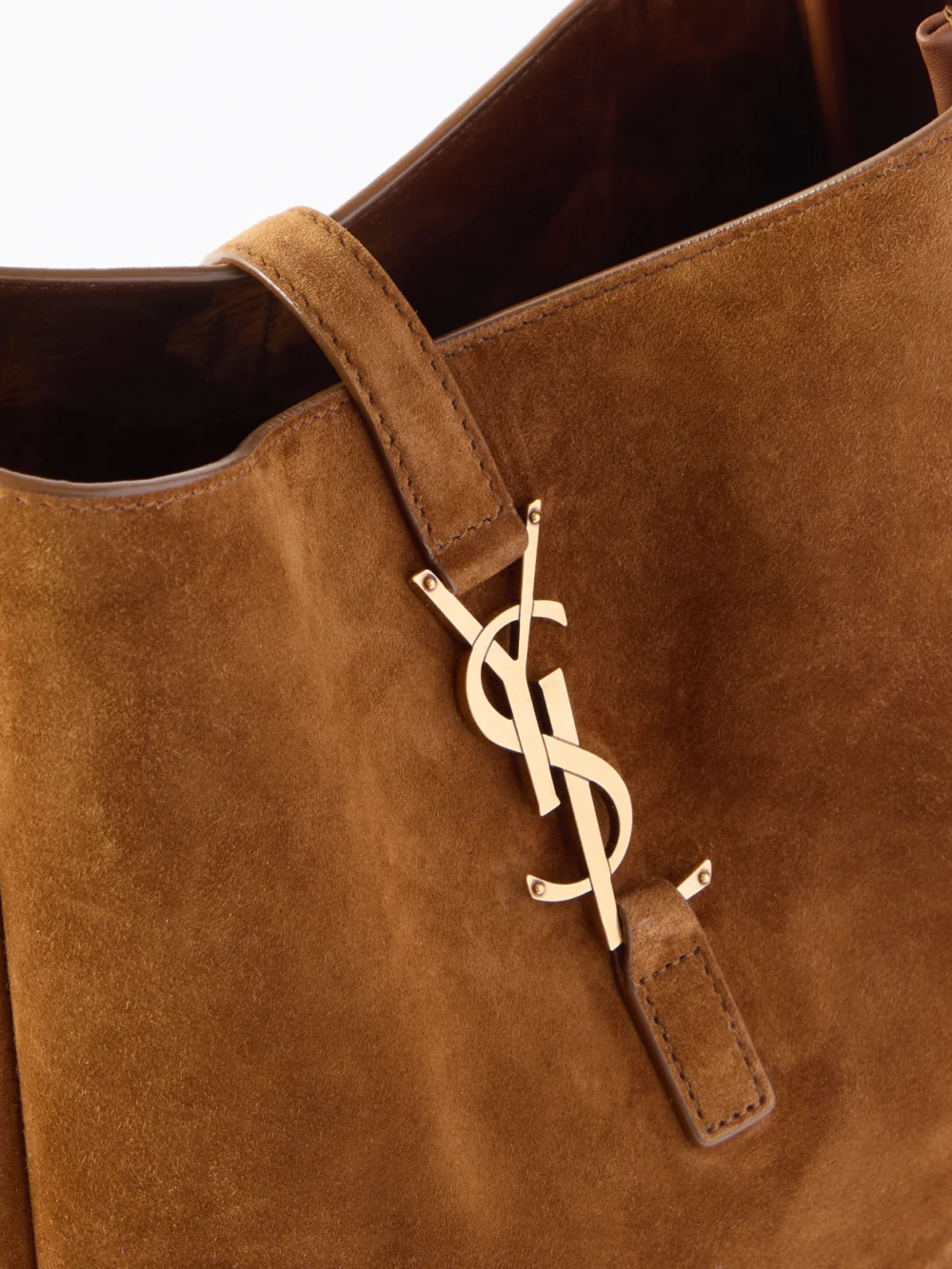 Close-up detail of the Saint Laurent Le 5 À 7 Supple Small Suede Shoulder Bag
