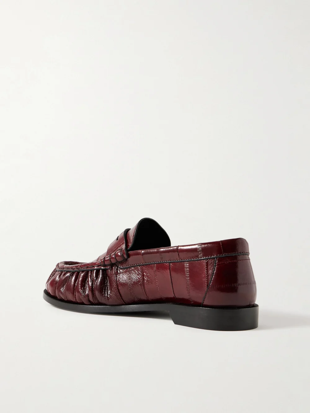 Back view of the Saint Laurent Le Loafer Cassandre-embellished Eel Loafers