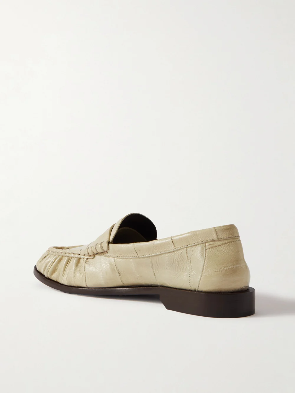 Back view of the Saint Laurent Le Loafer Cassandre-embellished Eel Loafers