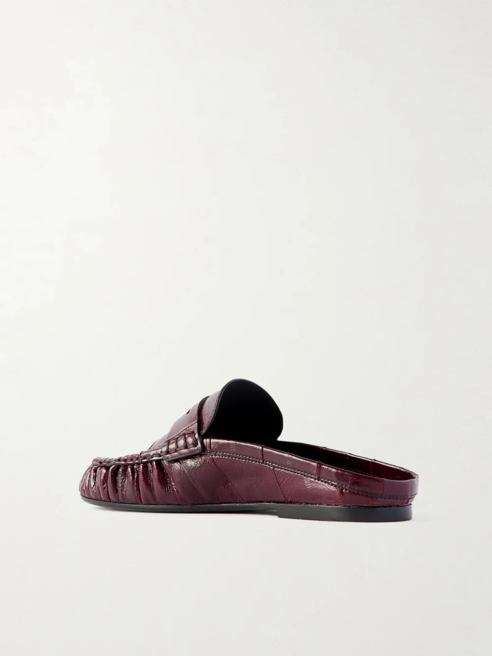Back view of the Saint Laurent Le Loafer Cassandre-embellished Eel Mules