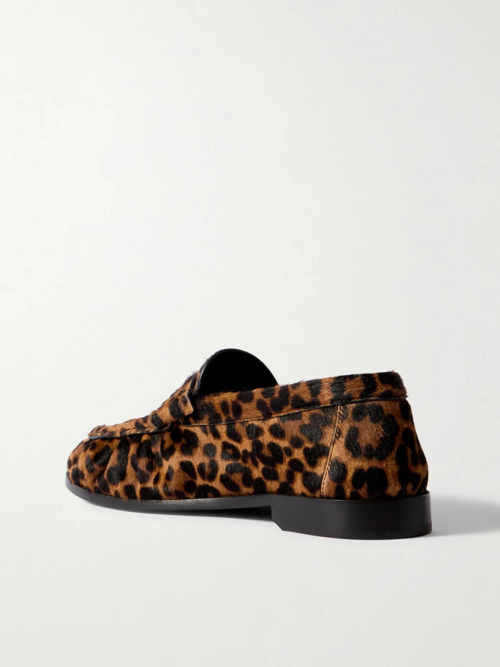 Back view of the Saint Laurent Le Loafer Cassandre-embellished Leopard-print Calf Hair Loafers