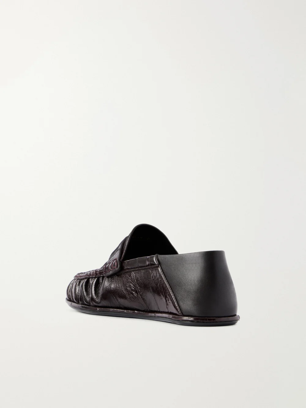 Back view of the Saint Laurent Le Loafers Cassandra-embellished Collapsible-heel Leather-trimmed Eel Loafers