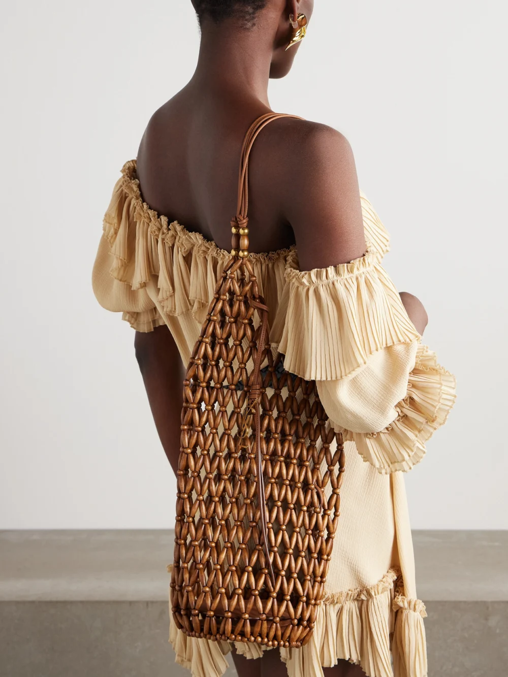 Saint Laurent Leather-trimmed Beaded Wood Tote, styled view