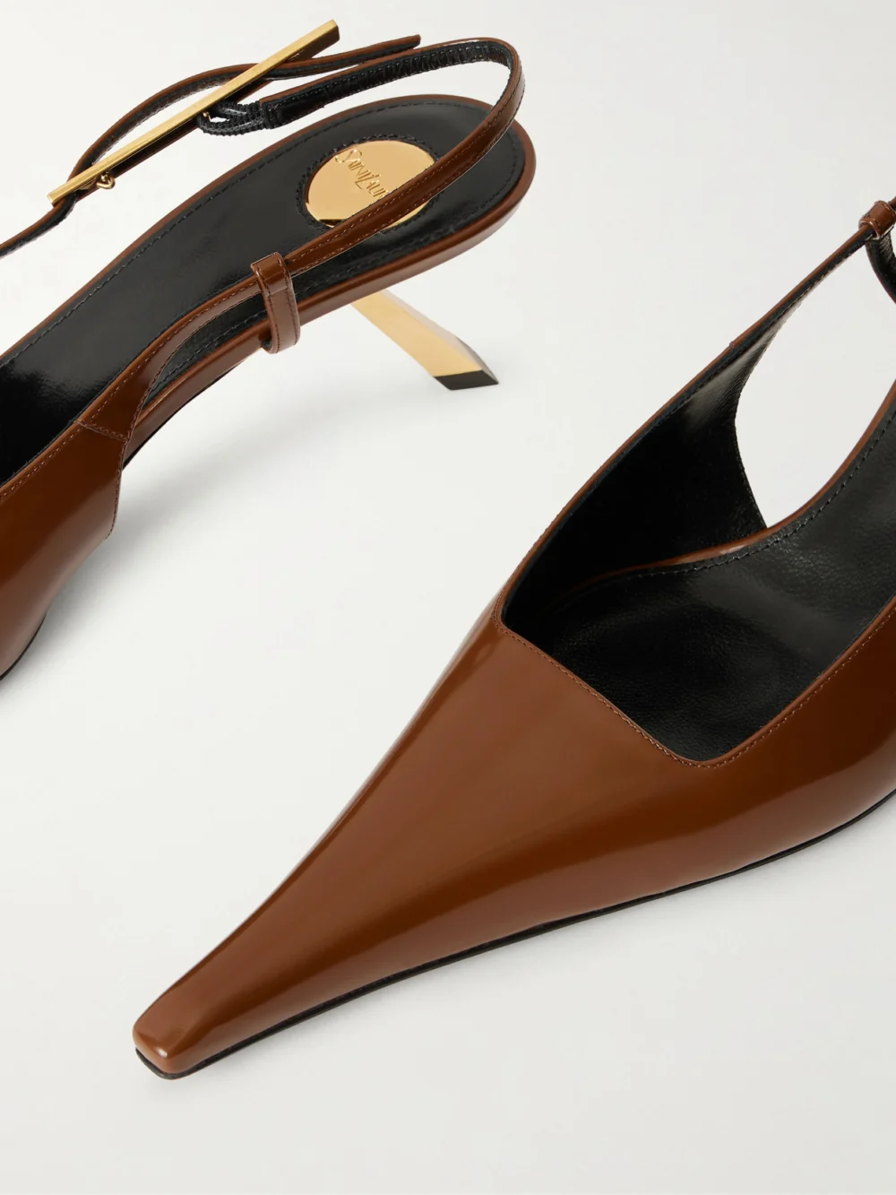 Close-up detail of the Saint Laurent Lee Glossed-leather Sandals