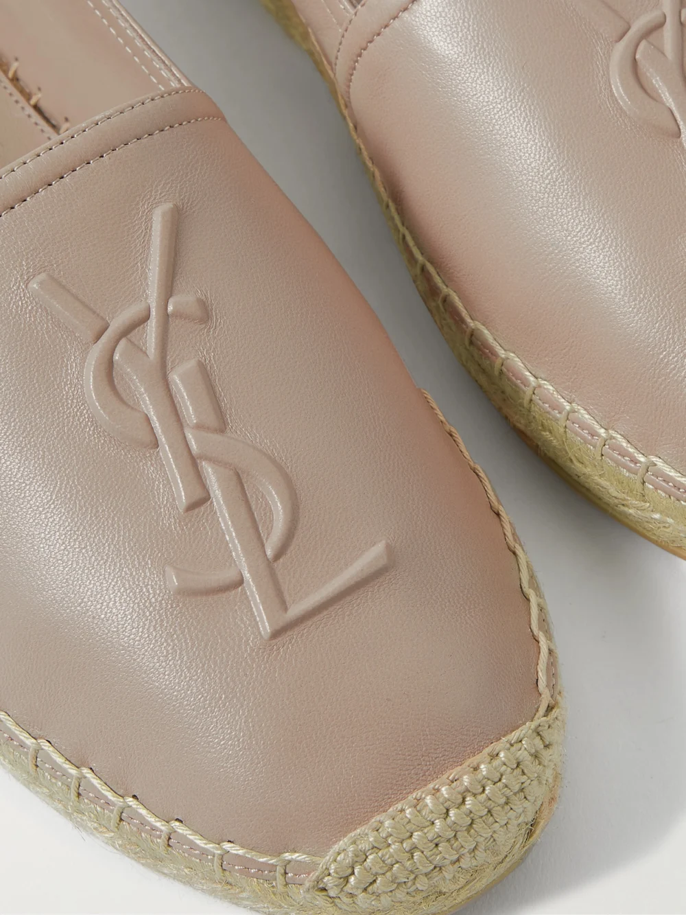 Close-up detail of the Saint Laurent Logo-embossed Leather Espadrilles