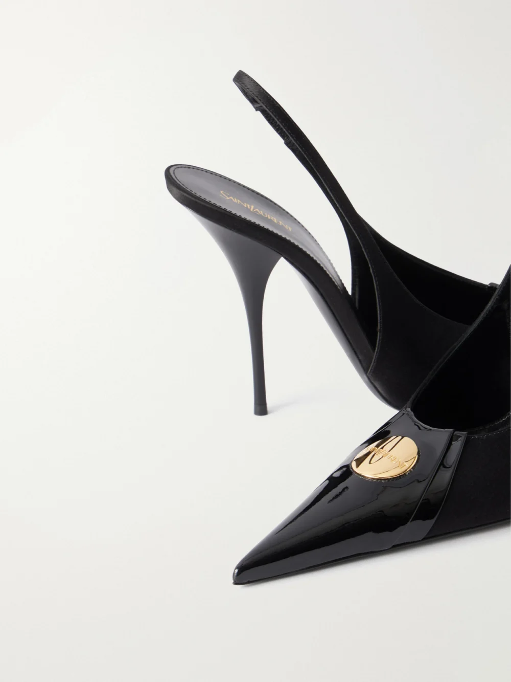 Close-up detail of the Saint Laurent Louis 110 Embellished Patent-leather Trimmed Satin Slingback Pumps