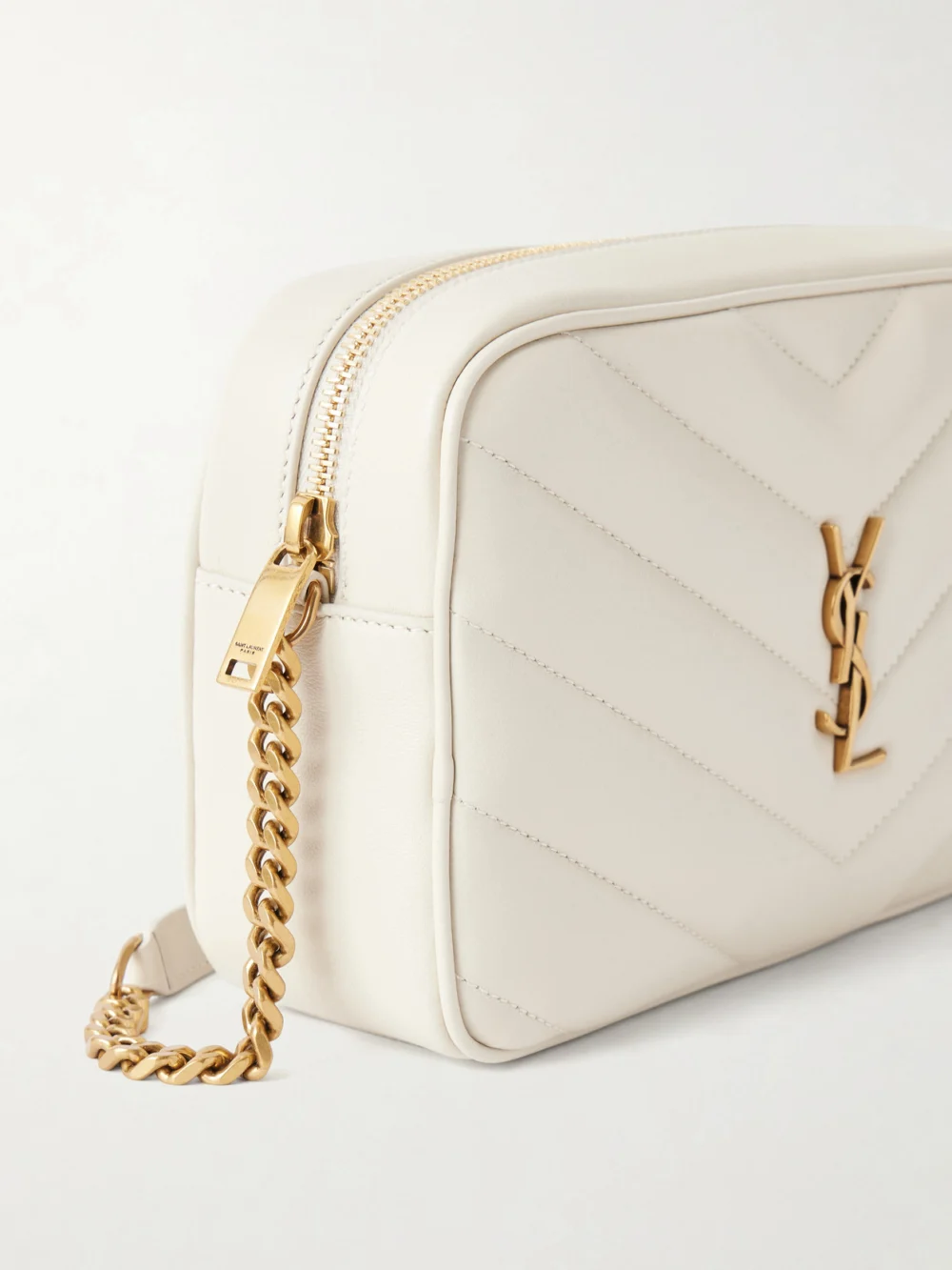 Close-up detail of the Saint Laurent Loulou Cassandre-embellished Matelassé Leather Shoulder Bag