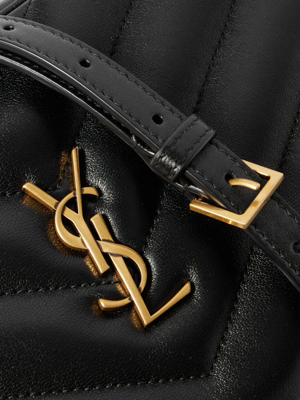 Close-up detail of the Saint Laurent Loulou Cassandre-embellished Matelassé Textured-leather Shoulder Bag