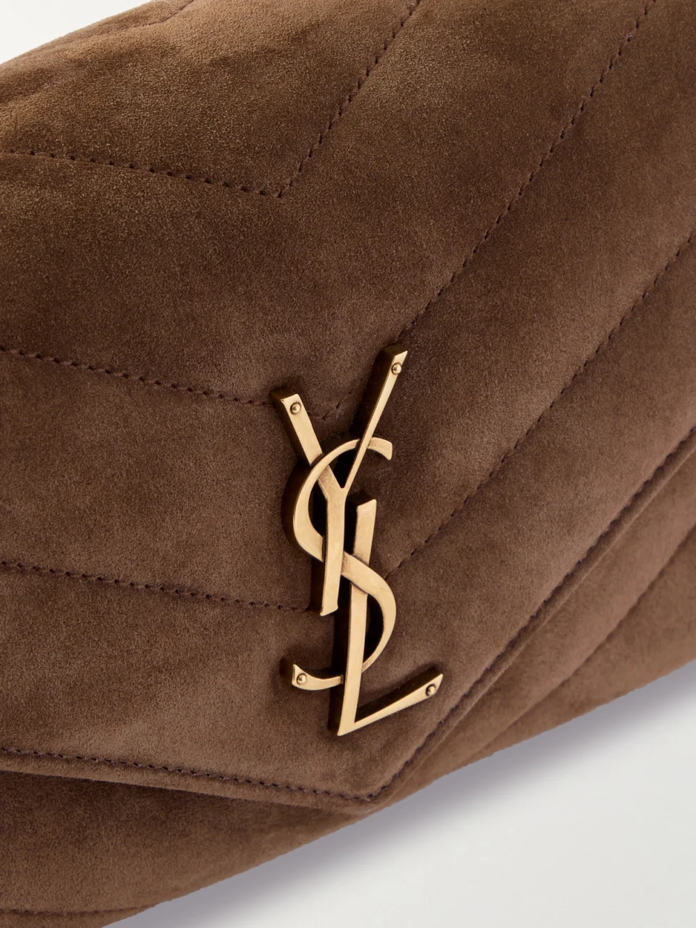 Close-up detail of the Saint Laurent Loulou Matelassé Suede Shoulder Bag