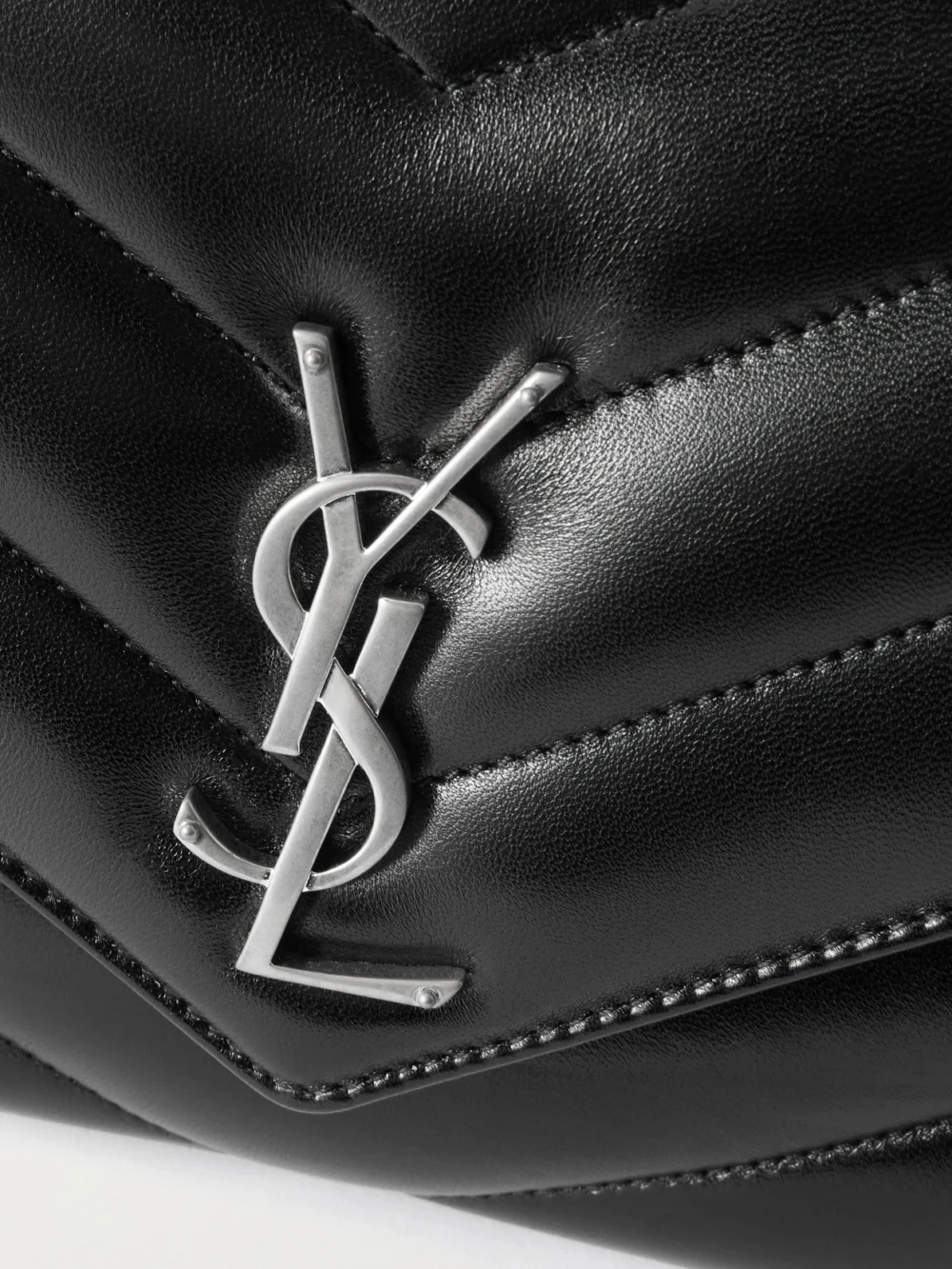 Close-up detail of the Saint Laurent Loulou Medium Matelassé Leather Shoulder Bag