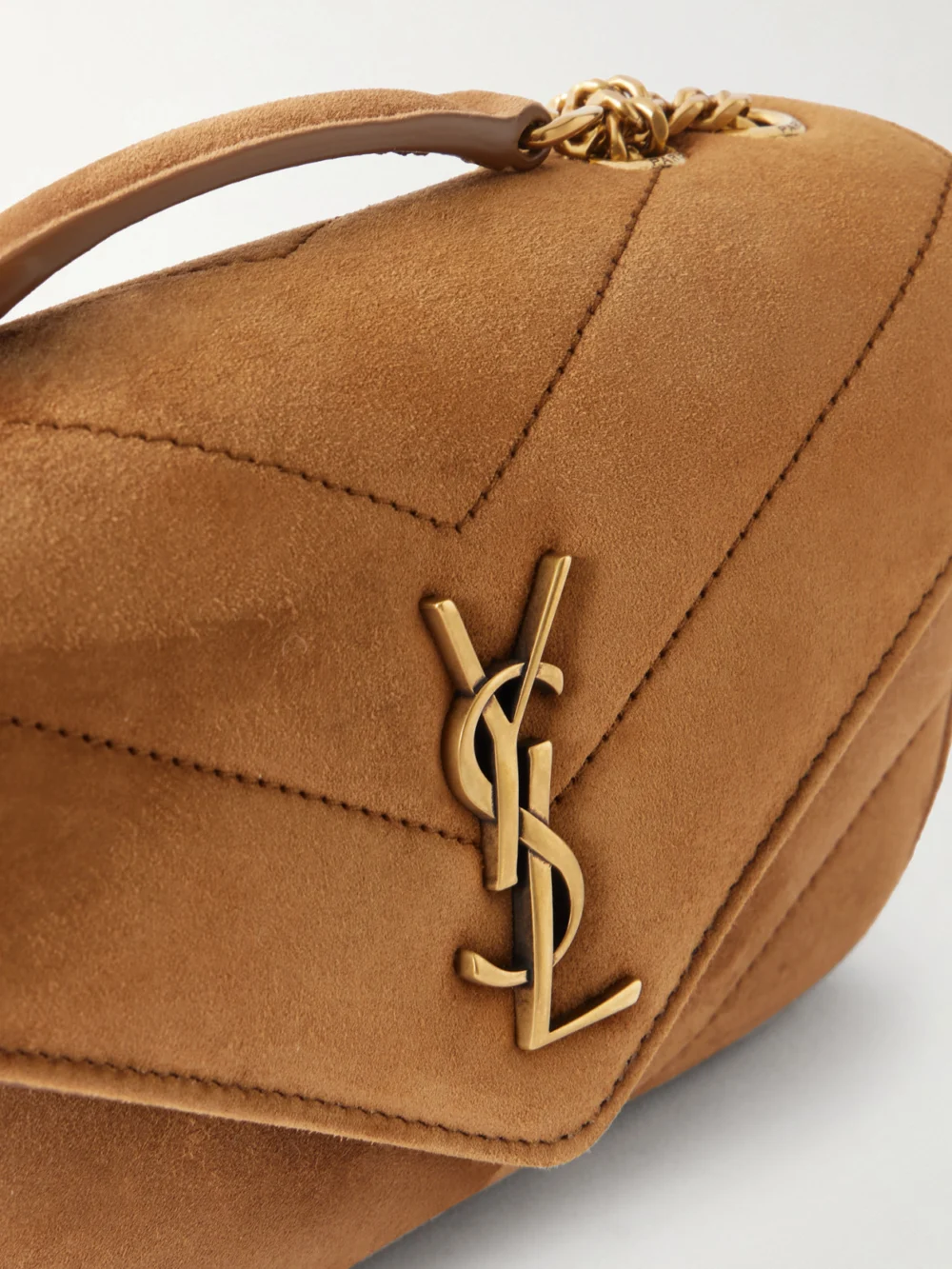 Close-up detail of the Saint Laurent Loulou Quilted Suede Shoulder Bag