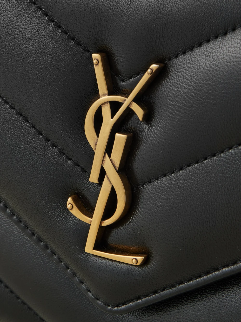 Close-up detail of the Saint Laurent Loulou Small Matelassé Leather Shoulder Bag