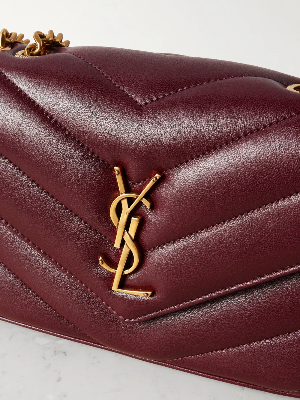 Close-up detail of the Saint Laurent Loulou Small Matelassé Leather Shoulder Bag