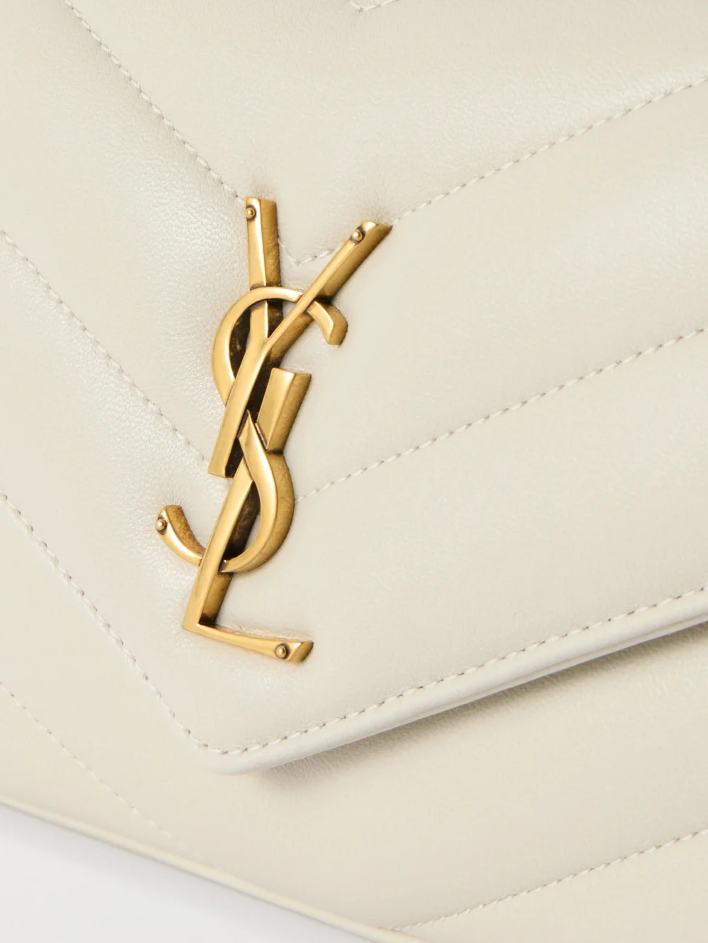 Close-up detail of the Saint Laurent Loulou Small Matelassé Leather Shoulder Bag