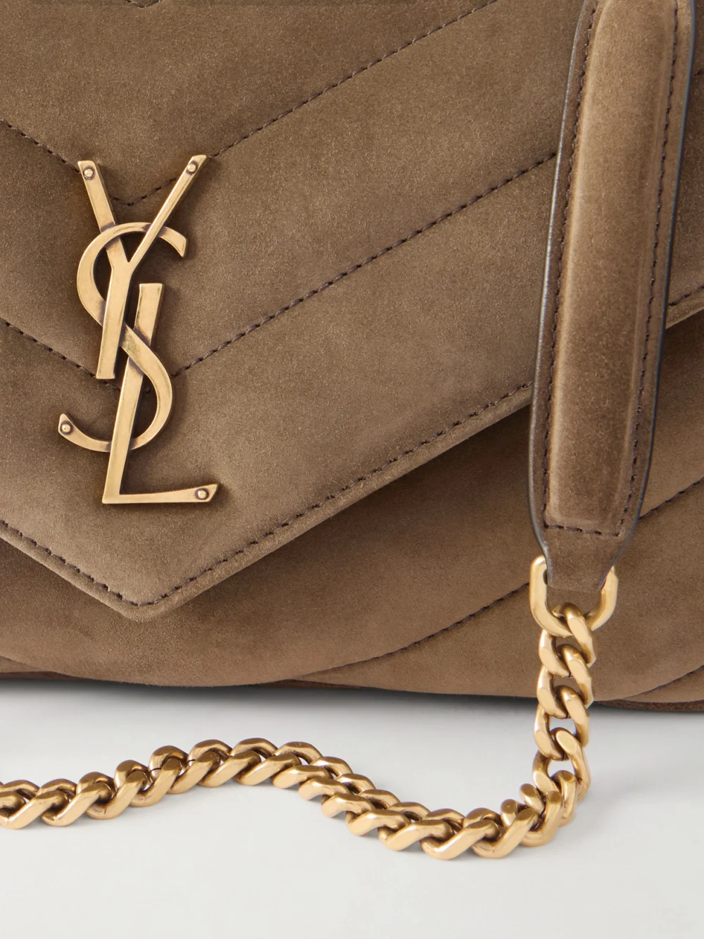 Close-up detail of the Saint Laurent Loulou Small Matelassé Suede Shoulder Bag