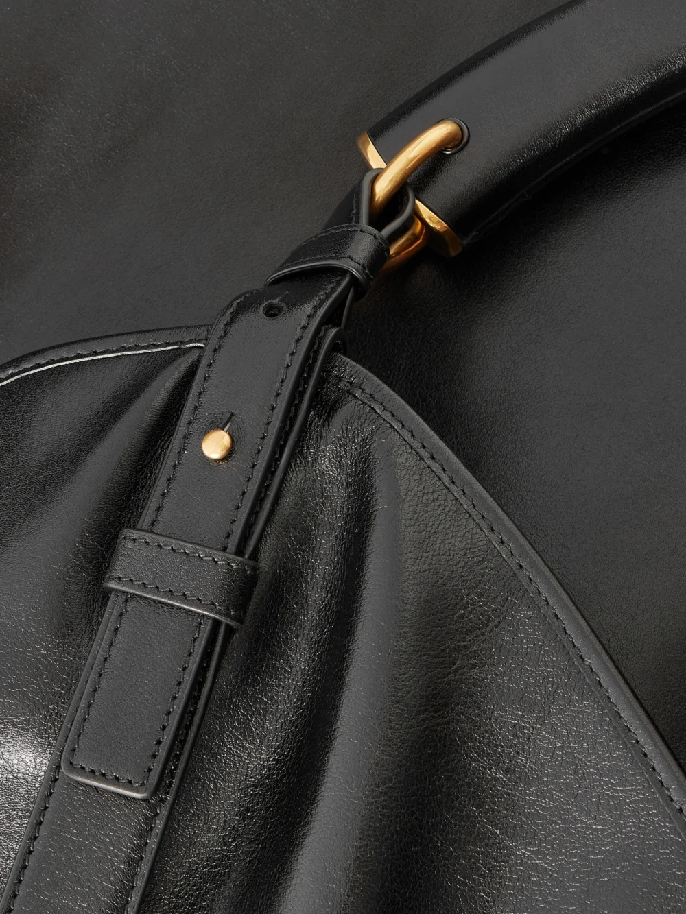 Close-up detail of the Saint Laurent Mombasa Paneled Leather Shoulder Bag