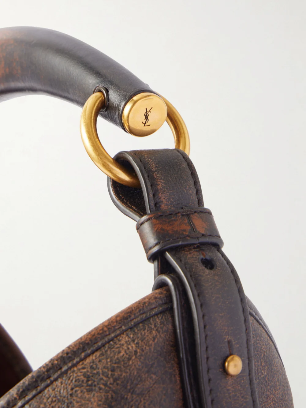 Close-up detail of the Saint Laurent Mombasa Paneled Leather Shoulder Bag
