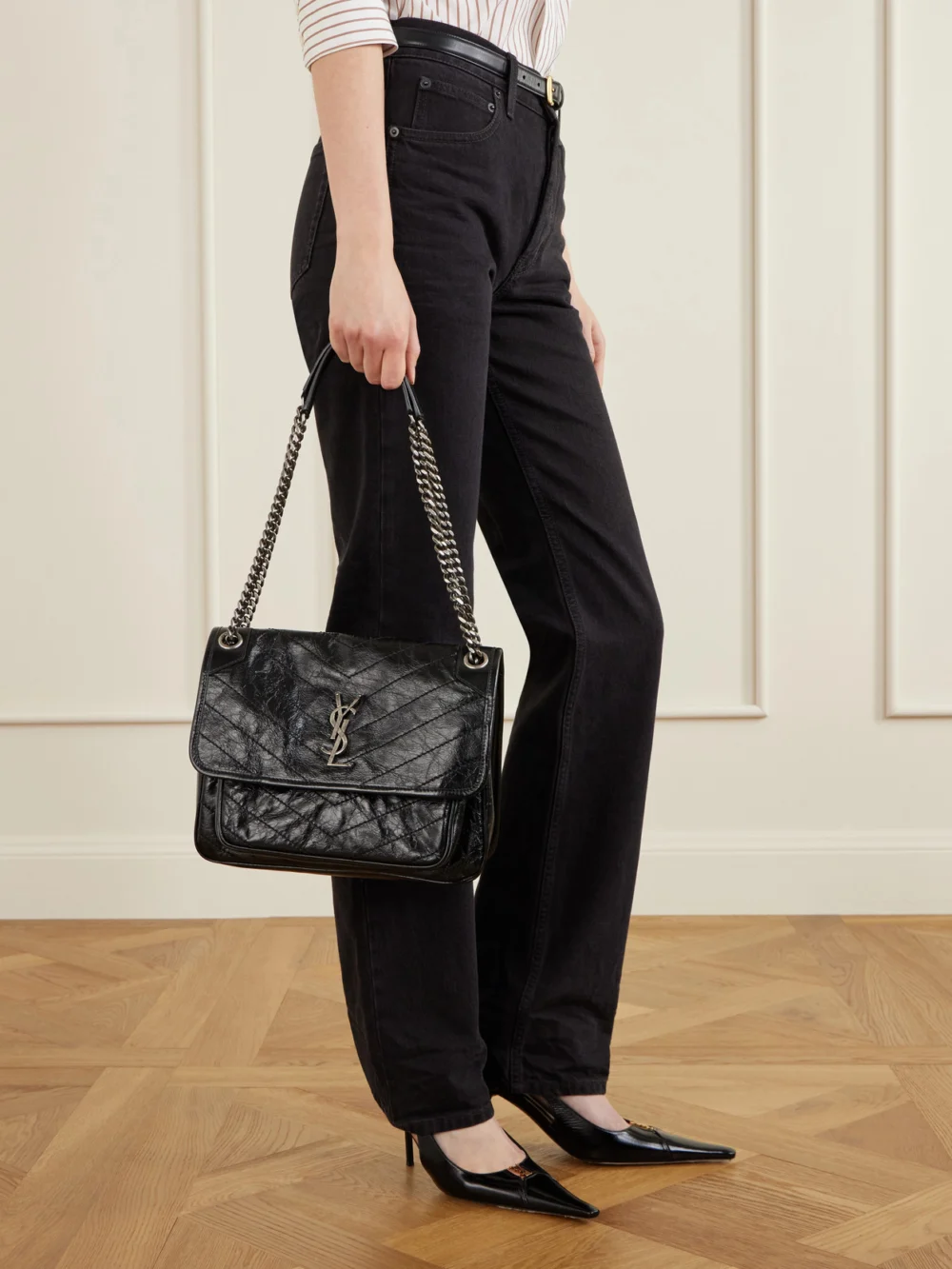 Saint Laurent Niki Medium Cassandre-embellished Crinkled Glossed-leather Shoulder Bag, styled view