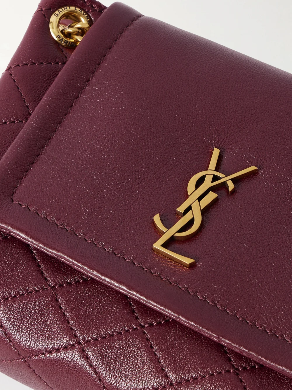 Close-up detail of the Saint Laurent Nolita Mini Quilted Leather Shoulder Bag