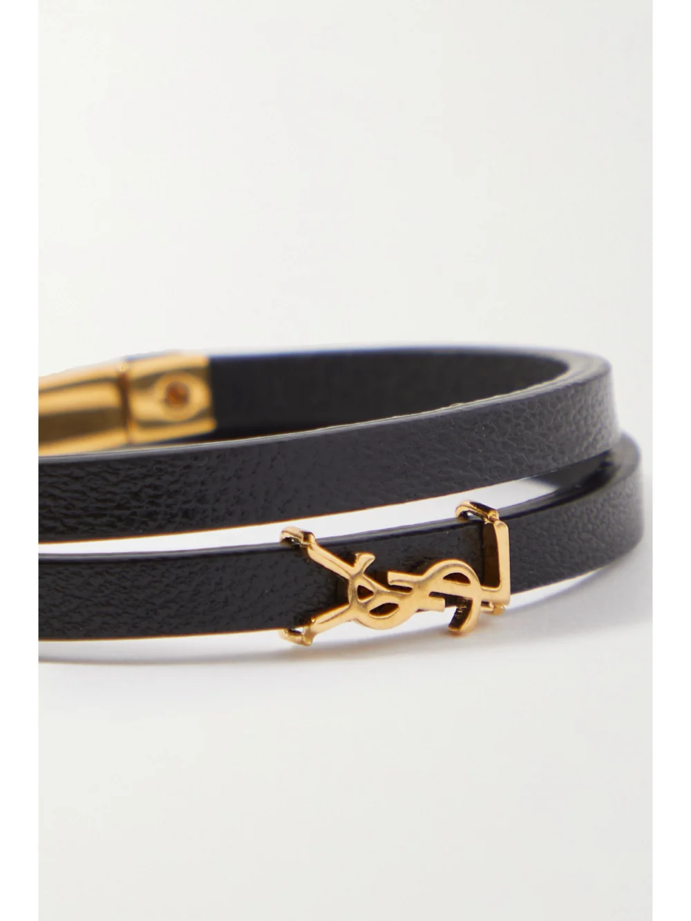 Close-up detail of the Saint Laurent Opyum Leather and Gold-tone Bracelet