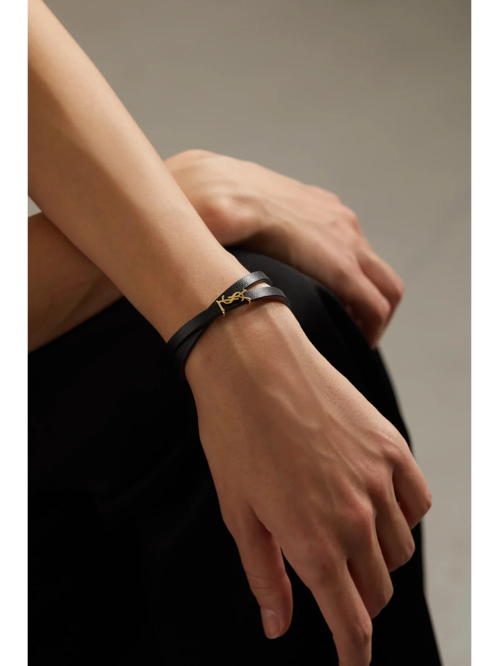 Saint Laurent Opyum Leather and Gold-tone Bracelet, styled view
