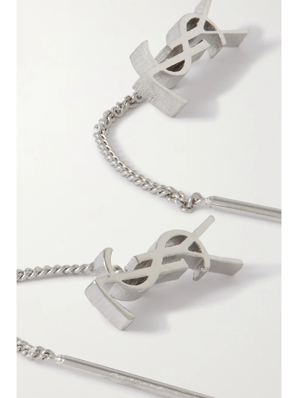 Close-up detail of the Saint Laurent Opyum Silver-tone Earrings