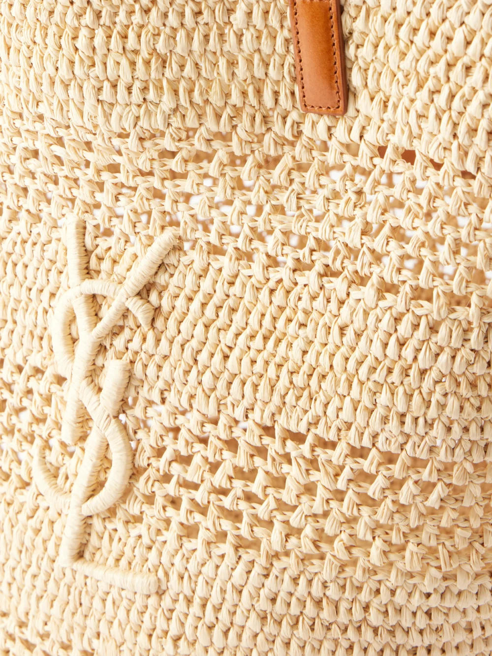 Close-up detail of the Saint Laurent Panier Large Leather-trimmed Raffia Tote