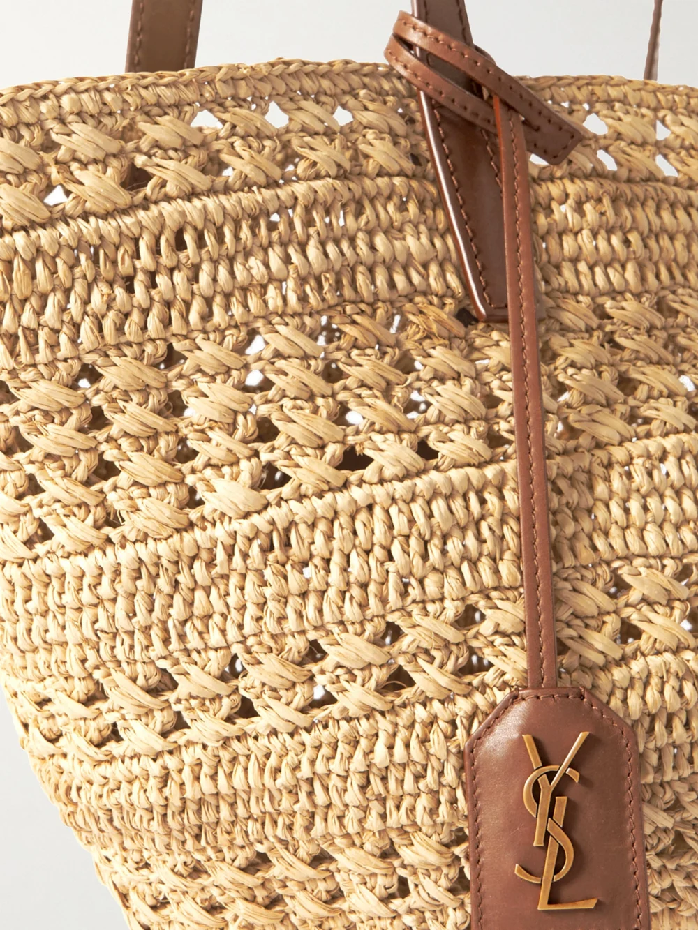 Close-up detail of the Saint Laurent Panier Small Leather-trimmed Raffia Tote
