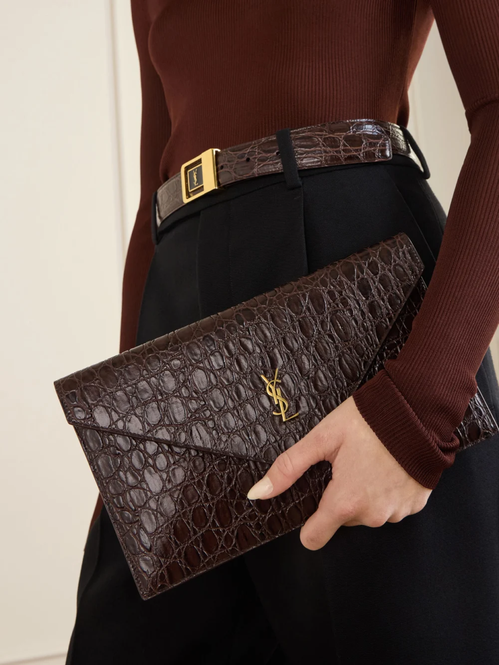 Saint Laurent Paris Cassandre-embellished Croc-effect Leather Clutch, styled view