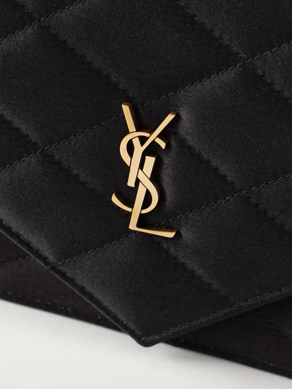 Close-up detail of the Saint Laurent Paris Quilted Satin Shoulder Bag