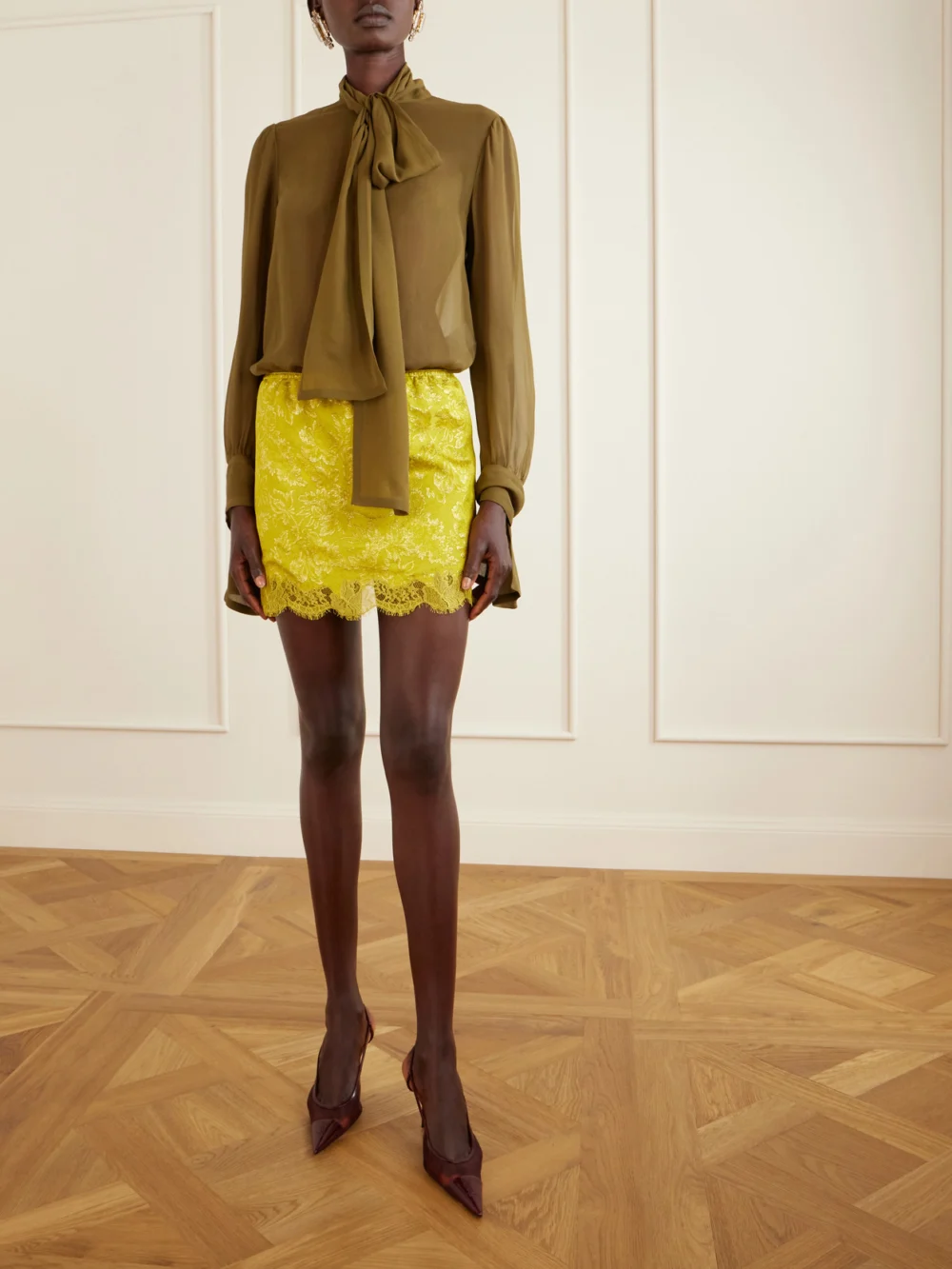 Saint Laurent Renée Cassandre-embroidered Patent Leather-trimmed Mesh Slingback Pumps, styled view