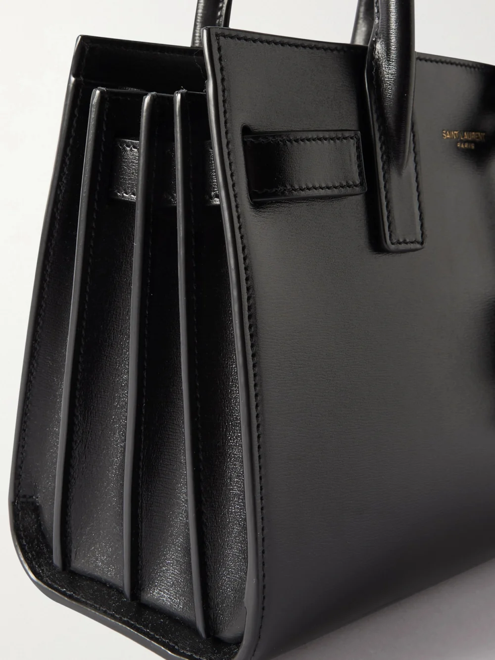 Close-up detail of the Saint Laurent Sac De Jour Nano Leather Top-handle Bag