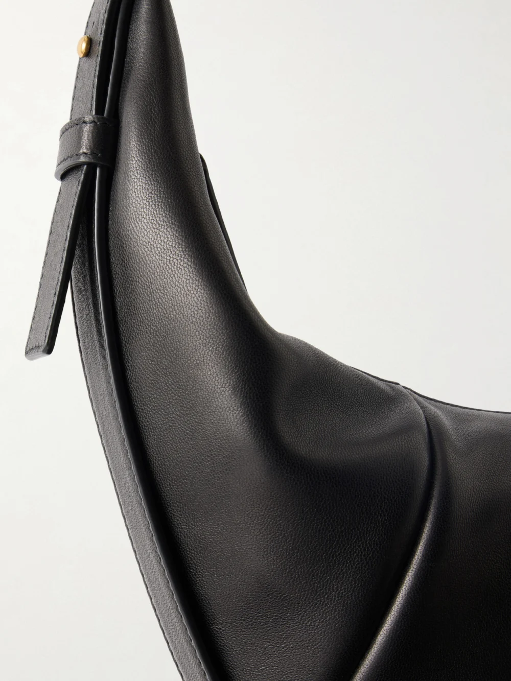 Close-up detail of the Saint Laurent Saharienne Leather Shoulder Bag