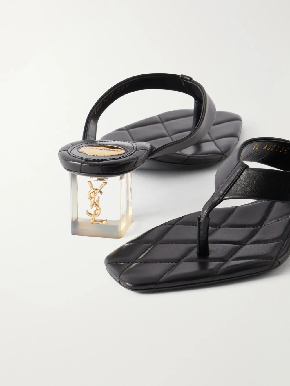 Close-up detail of the Saint Laurent Sip 45 Leather Thong Mules