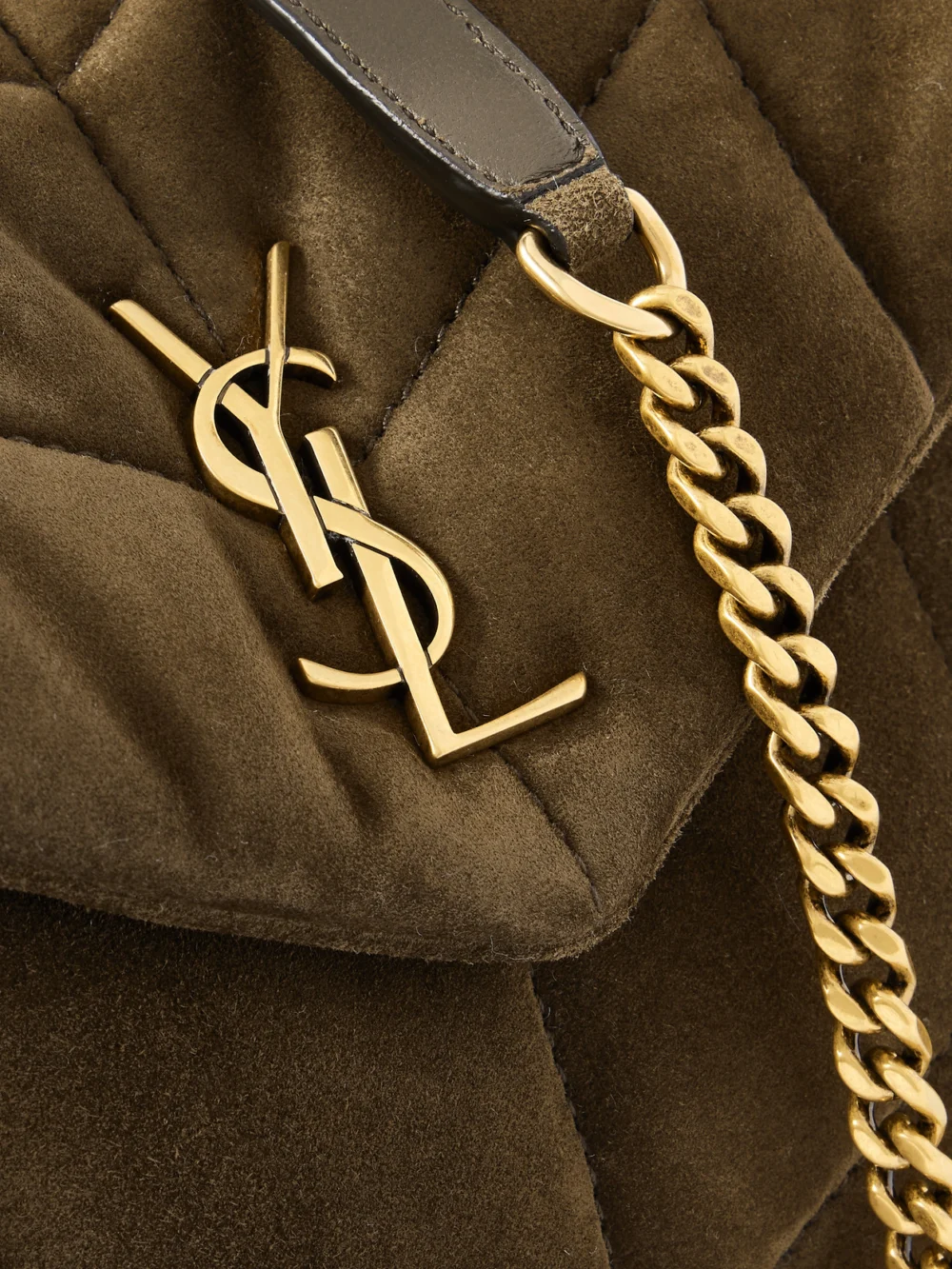 Close-up detail of the Saint Laurent Toy Puffer Matelassé Leather-trimmed Suede Shoulder Bag