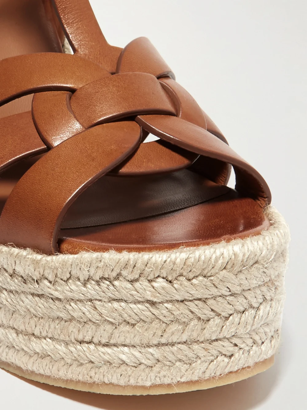 Close-up detail of the Saint Laurent Tribute Woven Leather Espadrille Wedge Sandals