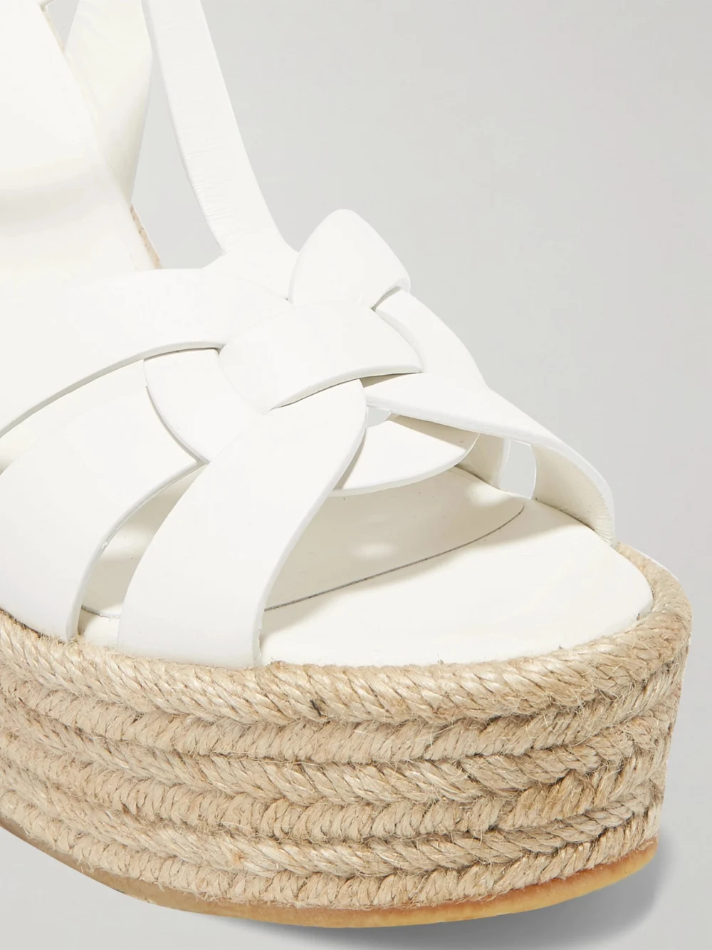 Close-up detail of the Saint Laurent Tribute Woven Leather Espadrille Wedge Sandals