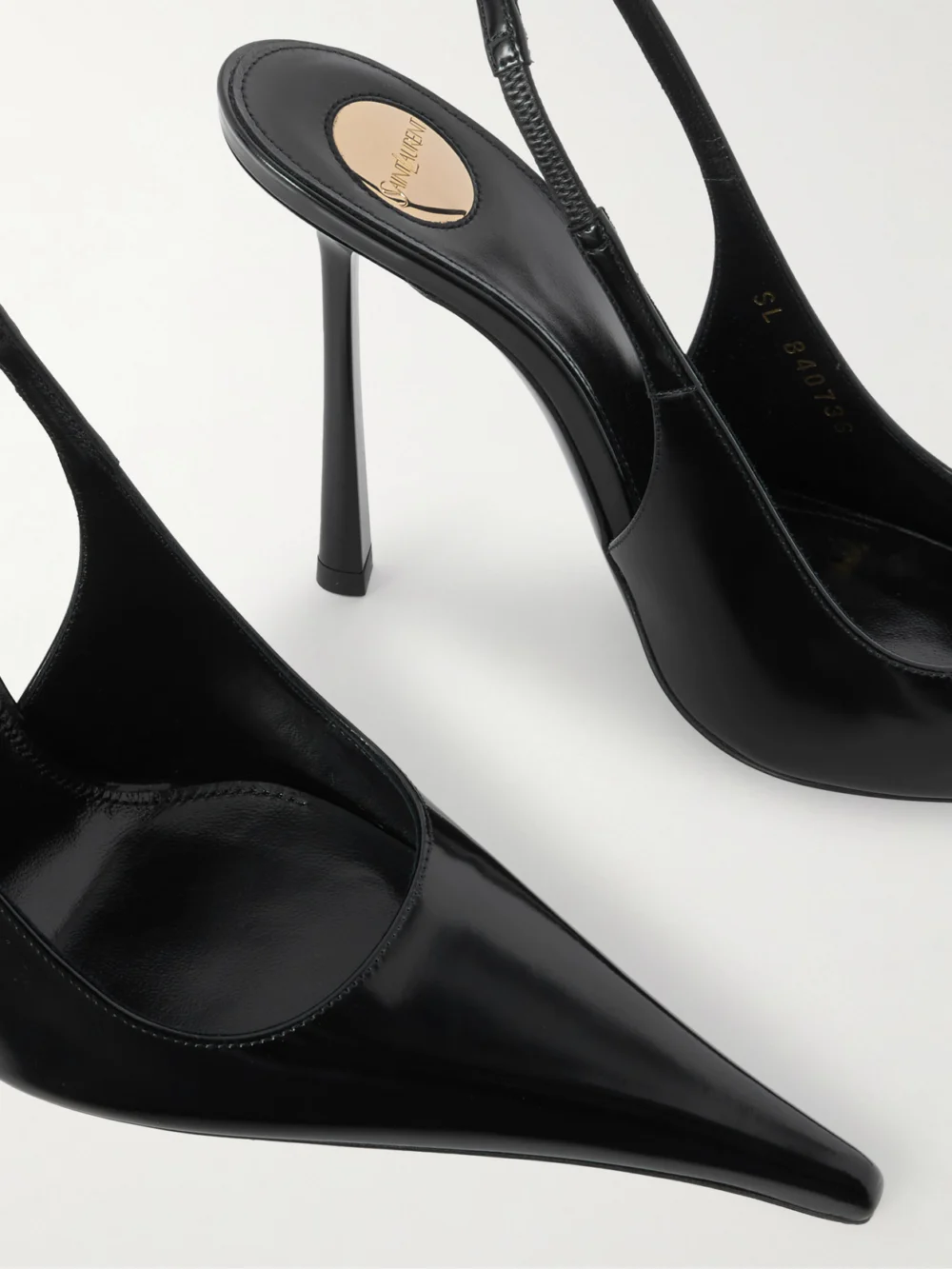 Close-up detail of the Saint Laurent Vendôme Glossed-leather Slingback Pumps