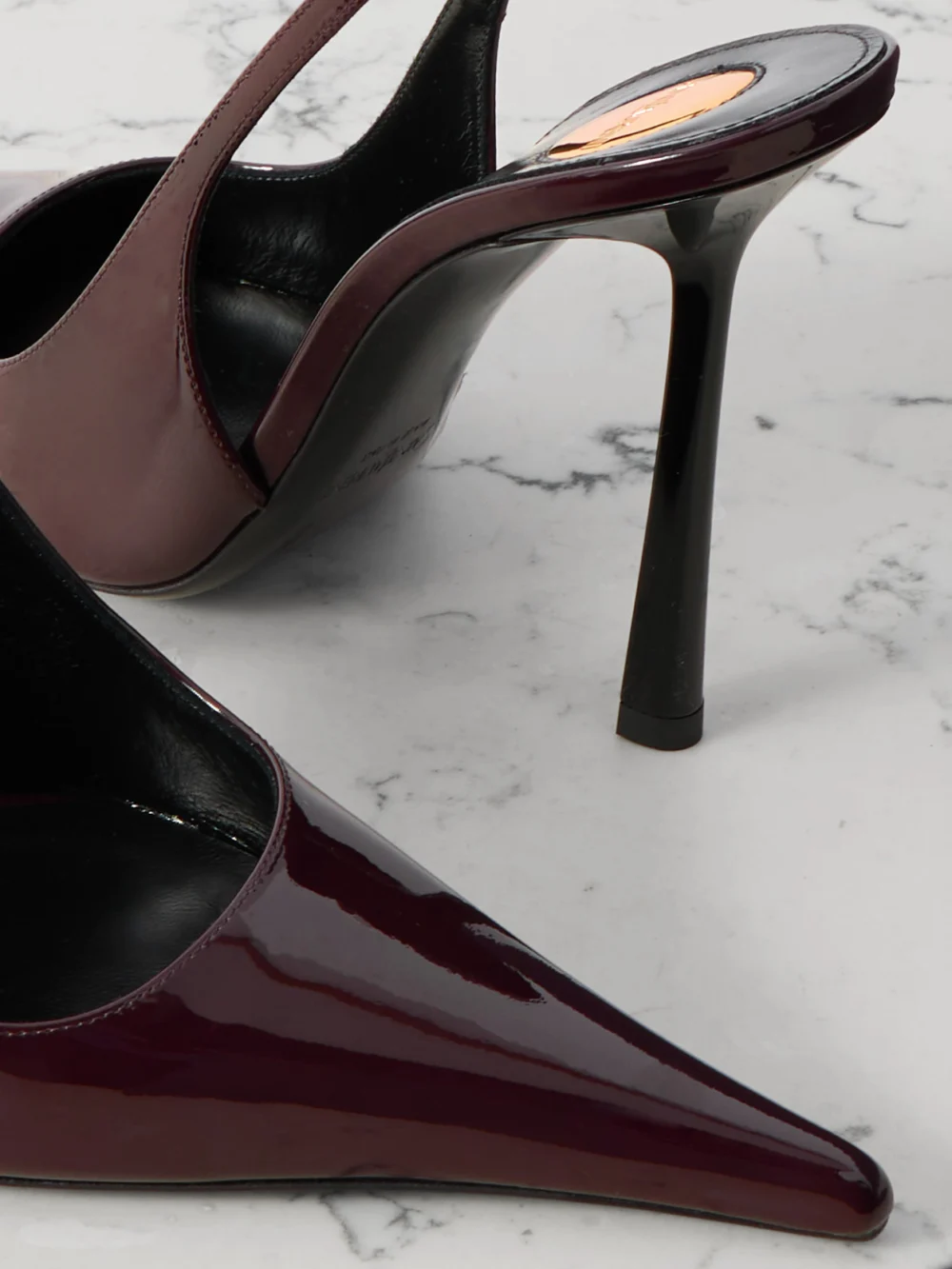 Close-up detail of the Saint Laurent Vendôme Glossed-leather Slingback Pumps