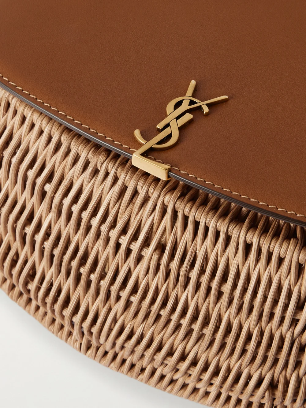 Close-up detail of the Saint Laurent Voltaire Top Handle Leather-trimmed Bamboo Shoulder Bag