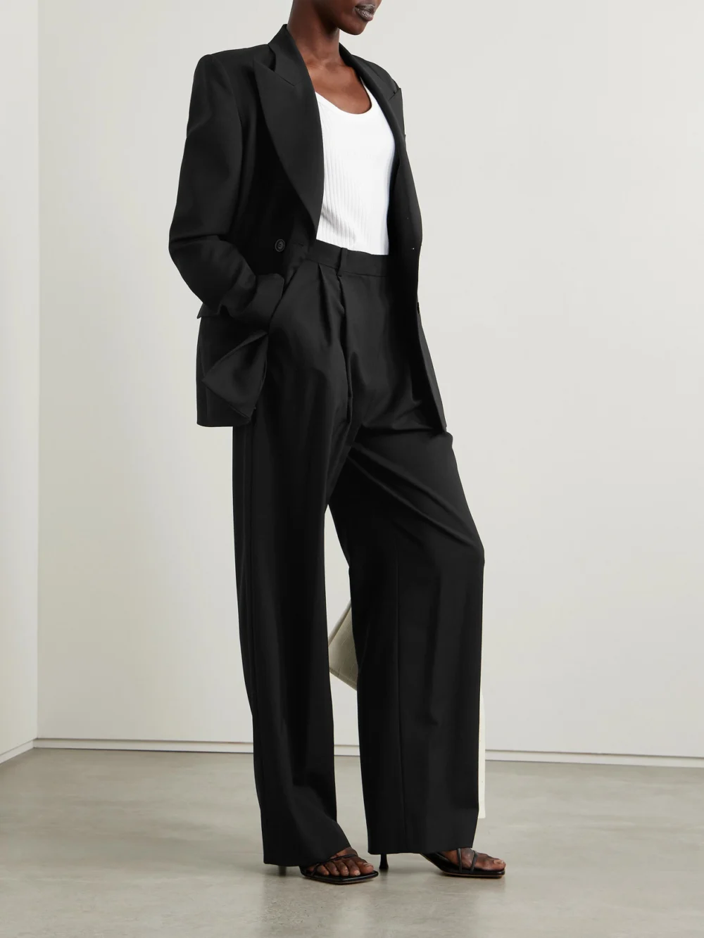 Salon 1884 Cecily Pleated Wool Wide-leg Pants, worn by a model