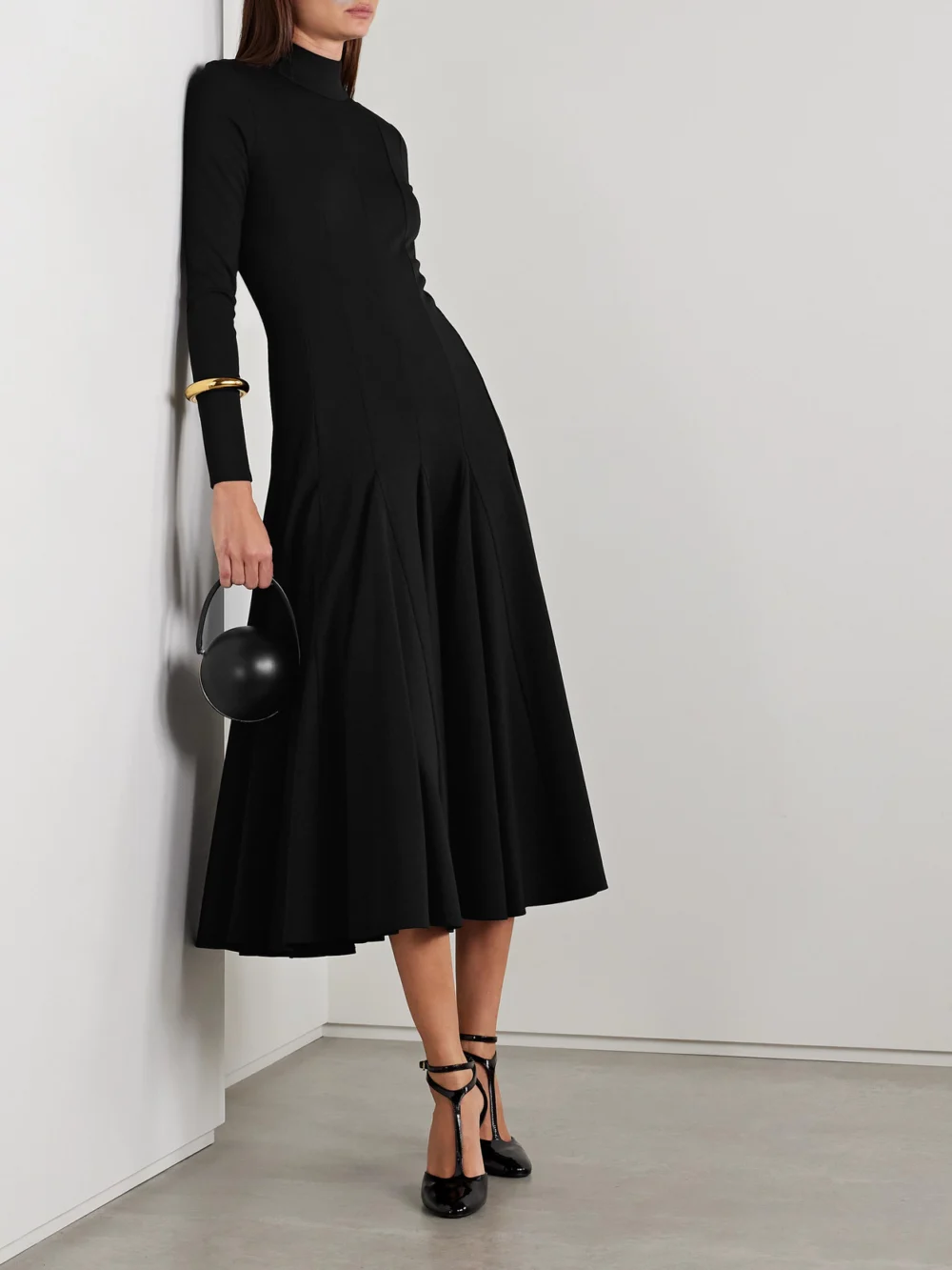 Salon 1884 Elodie Wool-blend Jersey Turtleneck Midi Dress, worn by a model