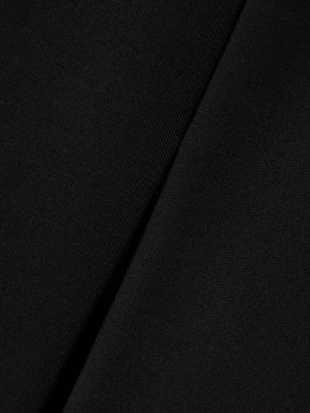 Close-up detail of the Salon 1884 Ezra Wool and Silk-blend Twill Skirt