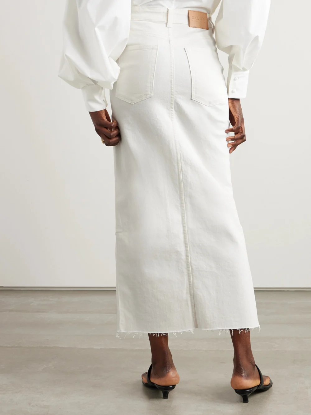 Back view of the Salon 1884 Orlan Frayed Denim Maxi Skirt