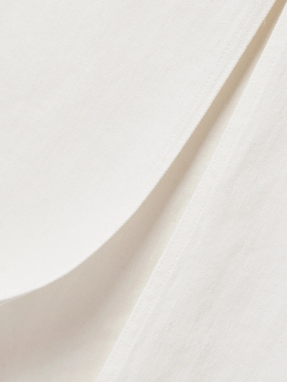 Close-up detail of the Salon 1884 Orlan Frayed Denim Maxi Skirt